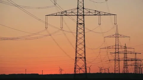 Sunset Wind Turbine And Power Lines