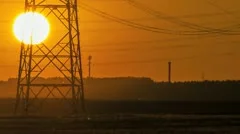 Sunset Wind Turbine And Power Lines