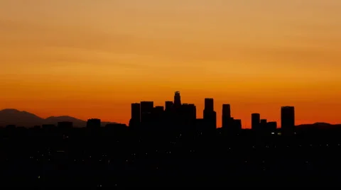 4K Time Lapse Tilt Shot Up Los Angeles Skyline Sunrise