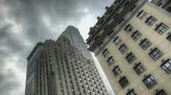 Hdr Timelapse Dark Clouds Above Skyscraper