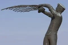 Statue Of A Fisherman