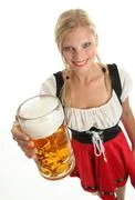 Bavarian Girl Cheers With A Beer 