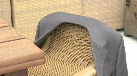 Jacket Is Placed Over A Chair