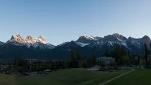 4K Time lapse zoom out 3 Sisters Mountains sunset Canmore