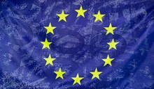 European flag with 500 Euro bills