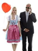 Woman In Dirndl With Bodyguard