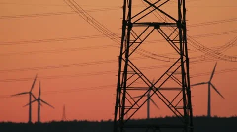 Sunset Wind Turbine And Power Lines