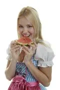 Woman In Dirndl Eats Watermelon